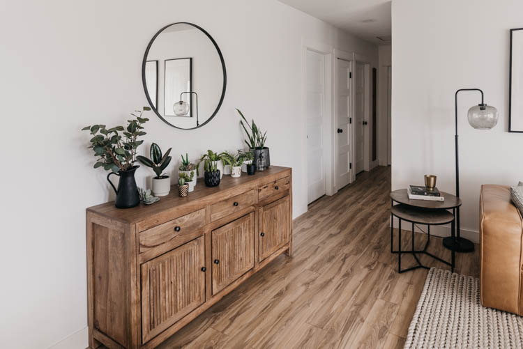 Family friendly summer home tour... love this modern space with light flooring and bright white walls!