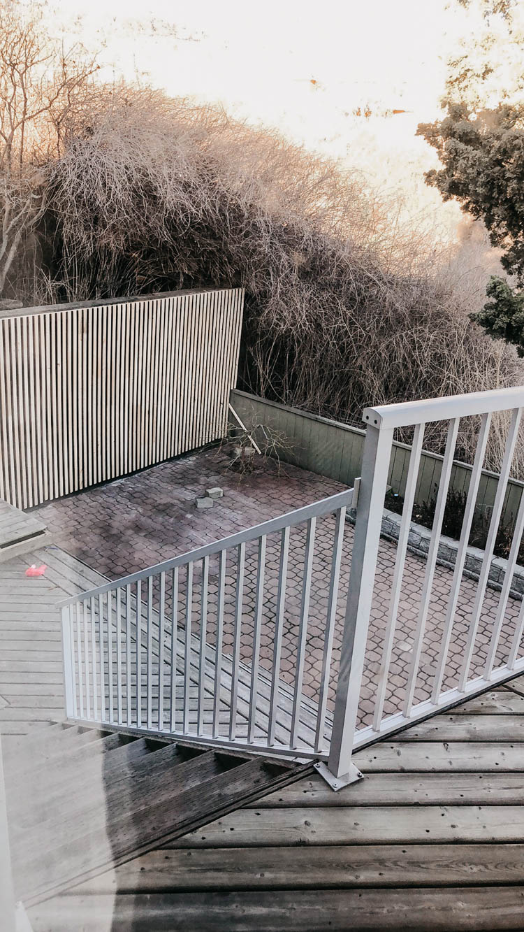 DIY Patio Screen over top of concrete retaining wall- such a great way to update a sitting area!