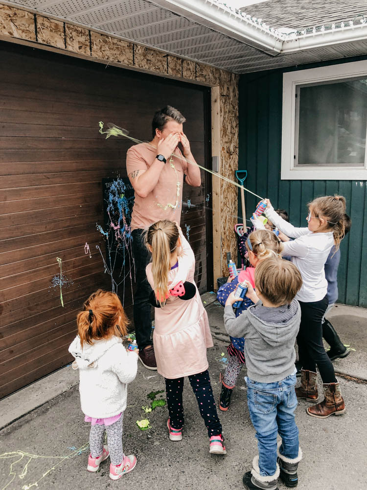 Spray String activity at a superhero birthday party... take aim spiderman!