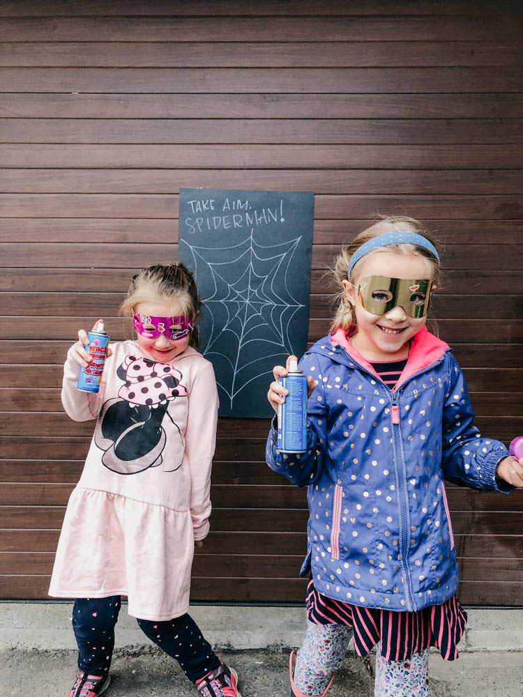 Spray String activity at a superhero birthday party... take aim spiderman!
