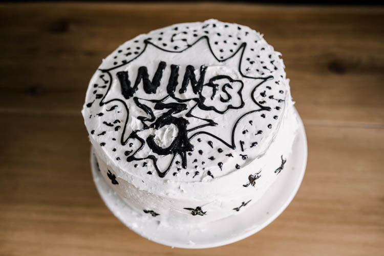 Superhero birthday party cake- so simple with the black and white!