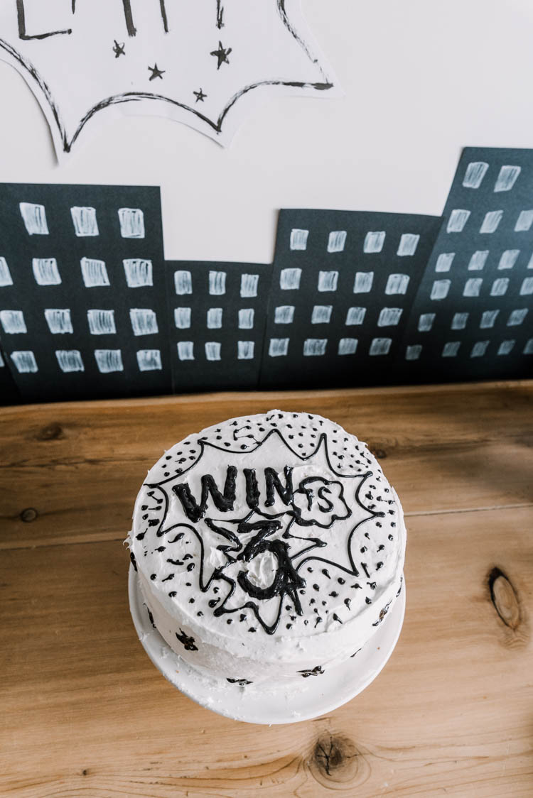 Superhero birthday party cake- so simple with the black and white!