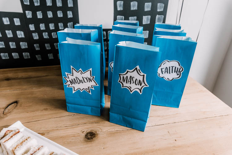 Simple party favor bags using dollar store paper bags, printer paper and a marker