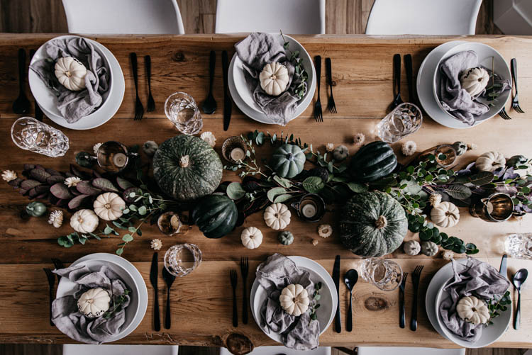 Hand Lettered mini pumpkins for place cards at a thanksgiving table