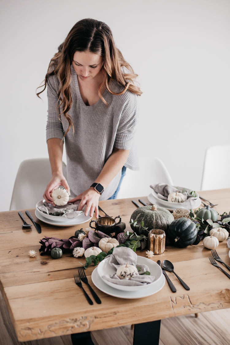Hand Lettered mini pumpkins for place cards at a thanksgiving table