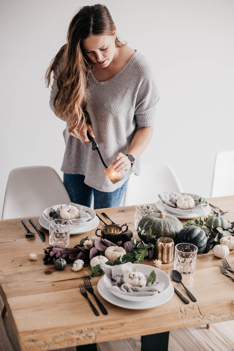 Lighting candles for thanksgiving dinner- beautiful tablescape