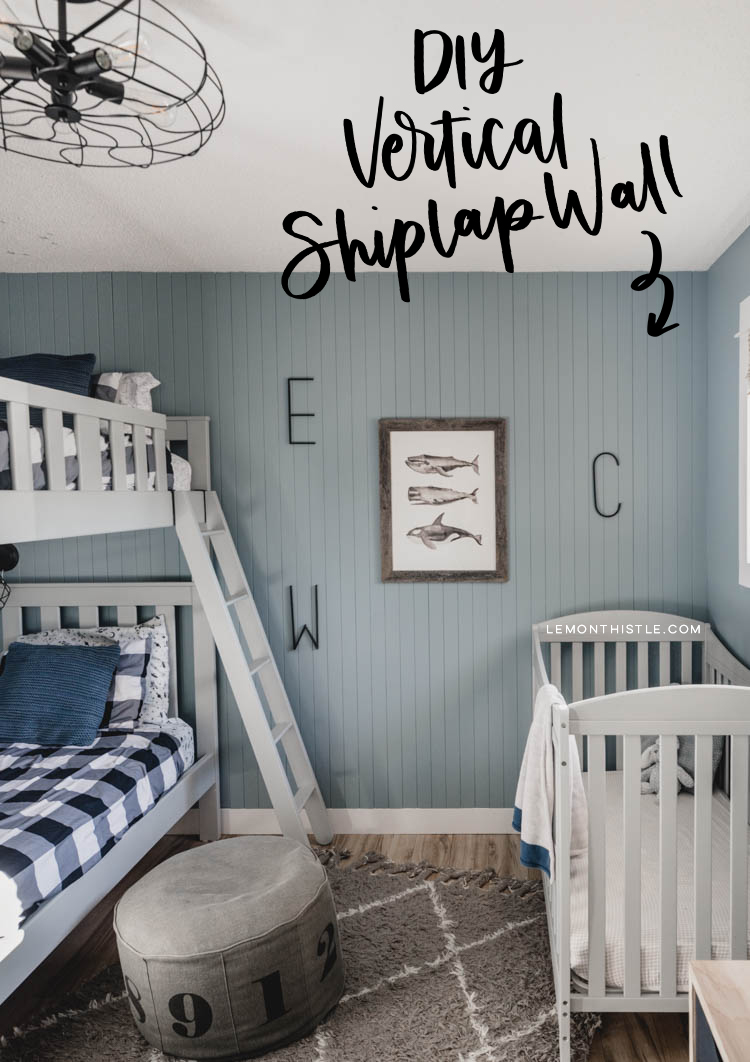 Finished space with the skinny vertical shiplap wall- text overlay DIY vertical shiplap wall