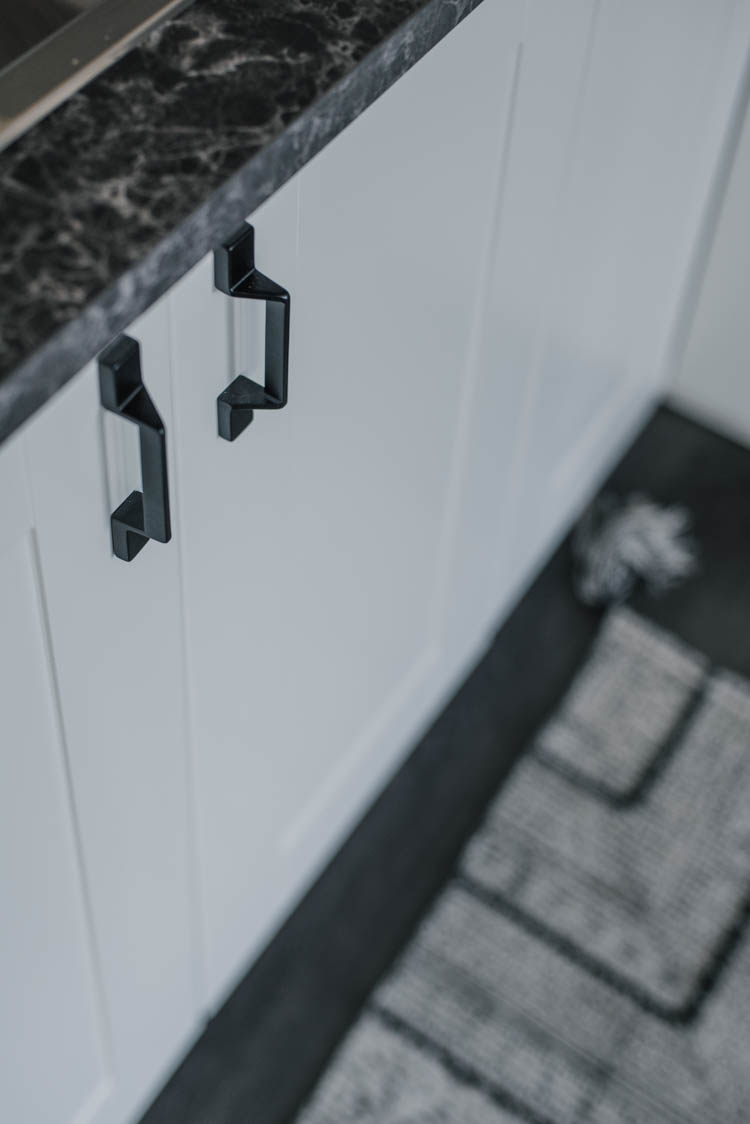 Modern black hardware- love the geometric shape of these on the white shaker cabinets!