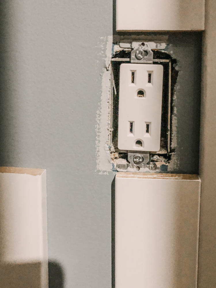 The EASIEST way to put together a DIY skinny vertical shiplap wall (and how to deal with plugs)