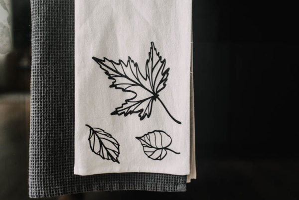 Fall tea towel with line art SVG leaves