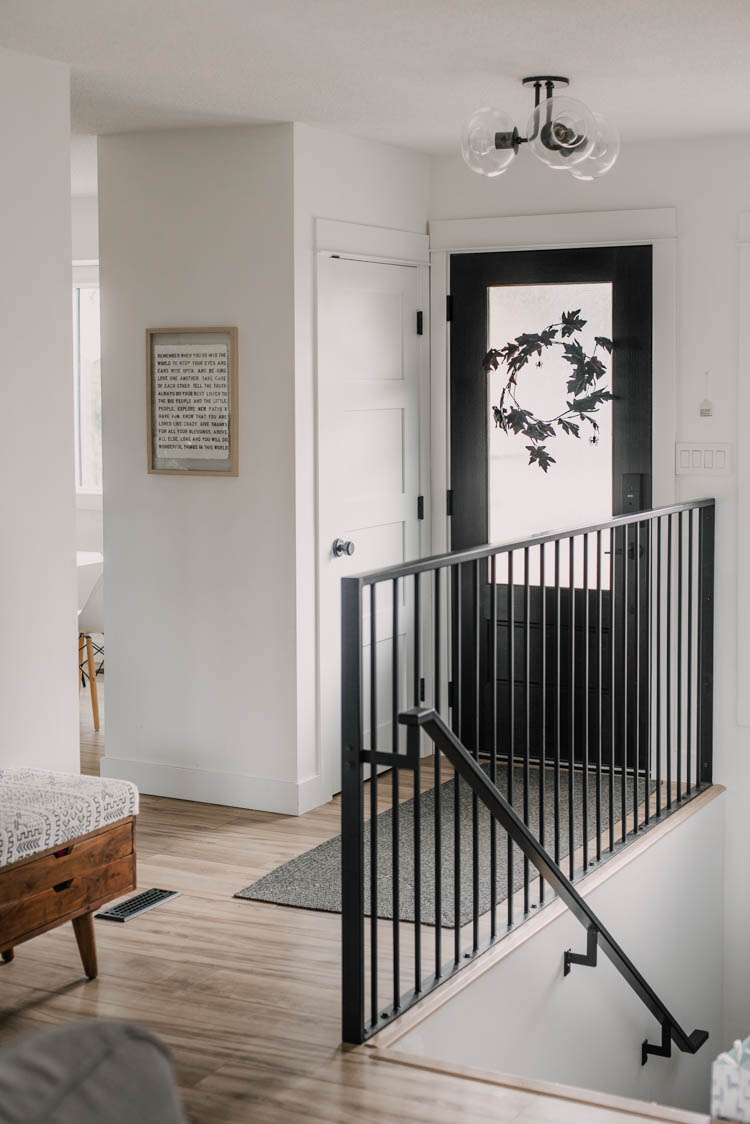 Modern halloween entryway- love the little spiders