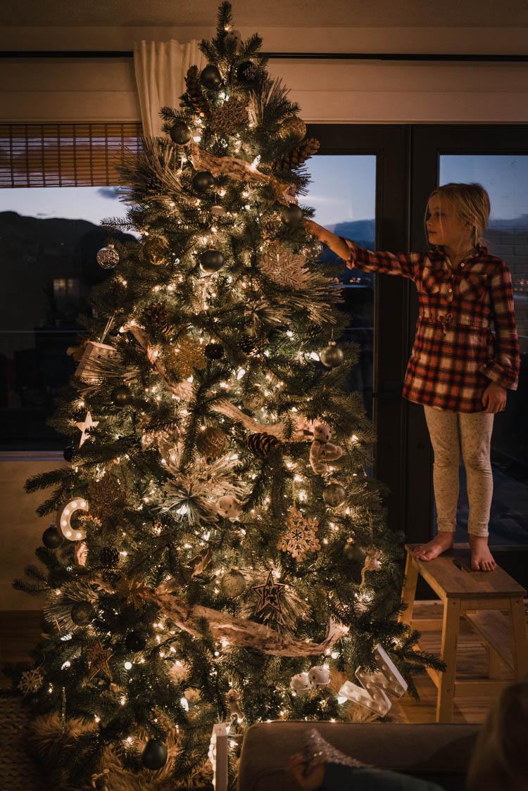 Beautiful white decorations on this family christmas tree
