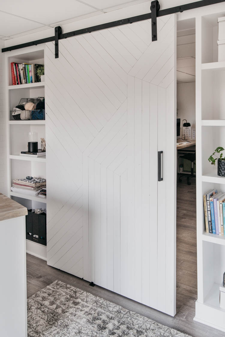 DIY Modern barn door over built in shelving