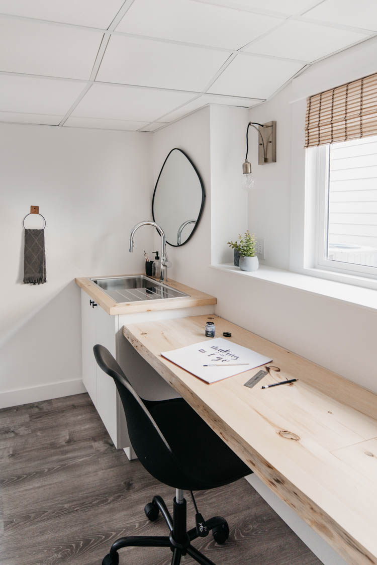 Sink corner in a basement office- perfect for water refills and paintbrush washing