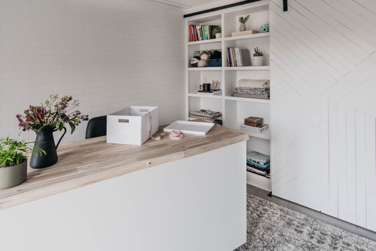 DIY built in shelving with rolling door... and rolling craft table in this office makeover