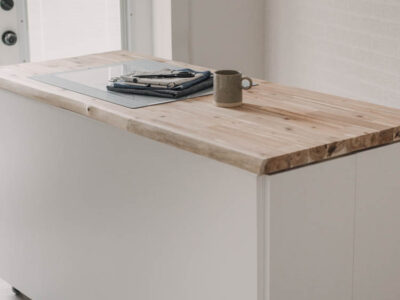 DIY craft table with hidden storage- love the counter height!