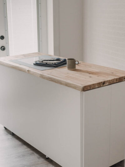 DIY craft table with hidden storage- love the counter height!