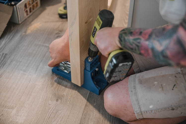 Use a kreg jig to attach boards together end to end for a long live edge table top