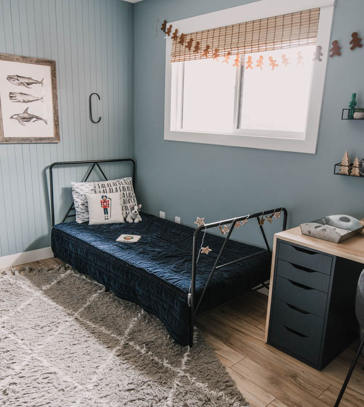 Adding christmas decorations to kids bedrooms- love the subtle touches like the gingerbread garland!