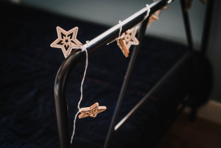 Twinkle lights on the footboard for kids- love the simple details for kids bedrooms at Christmas time.