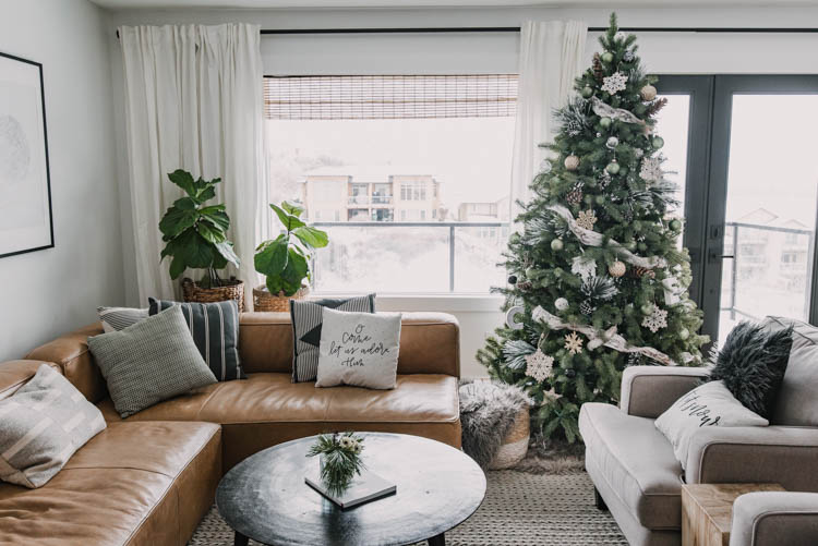 Cozy neutrals holiday decorations- with that leather sectional!