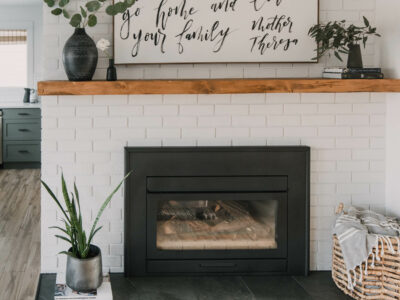 modern rustic diy brick fireplace makeover... love the painted brick, tile hearth and the chunky wood mantel