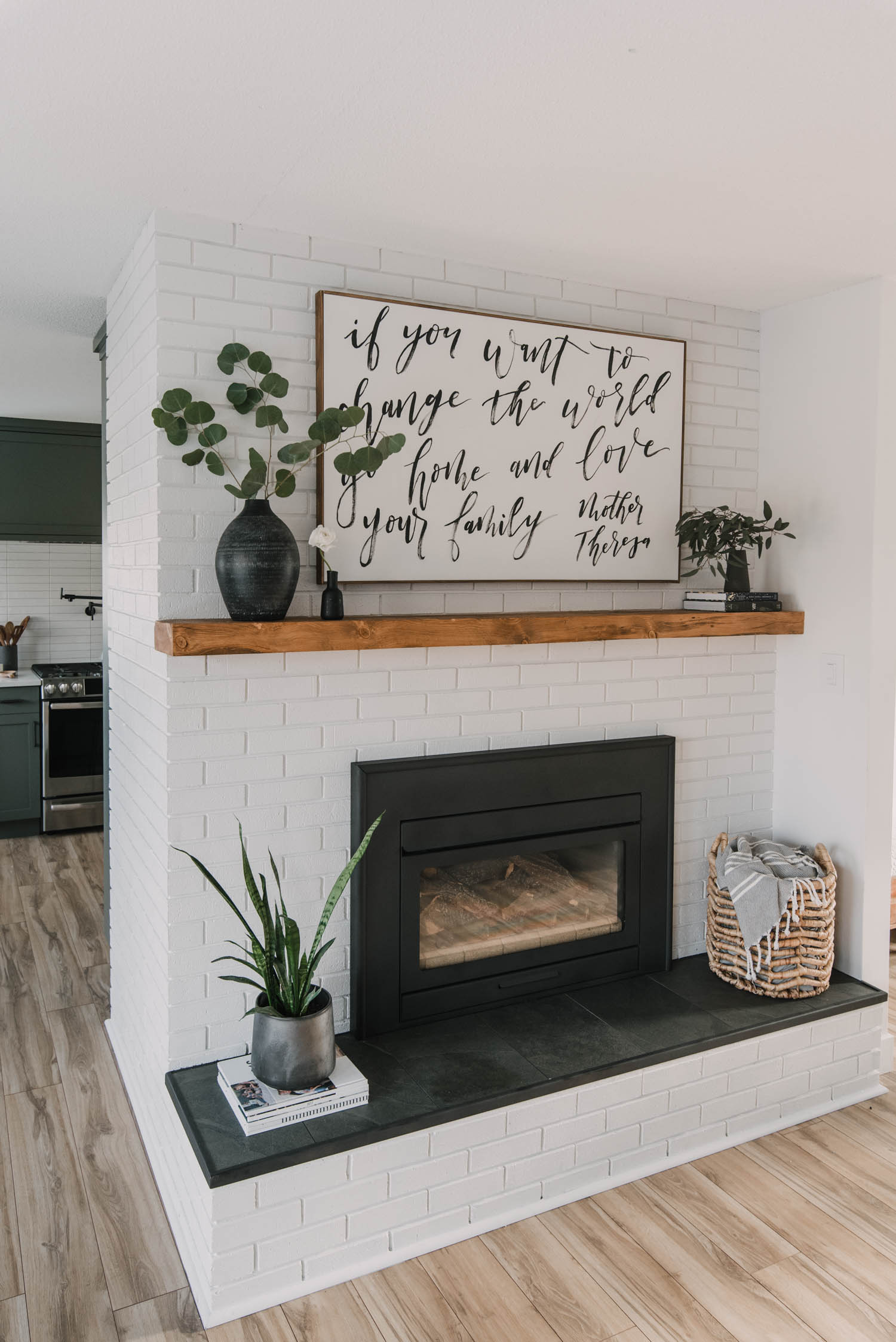 brick fireplace makeover with rustic wood mantel