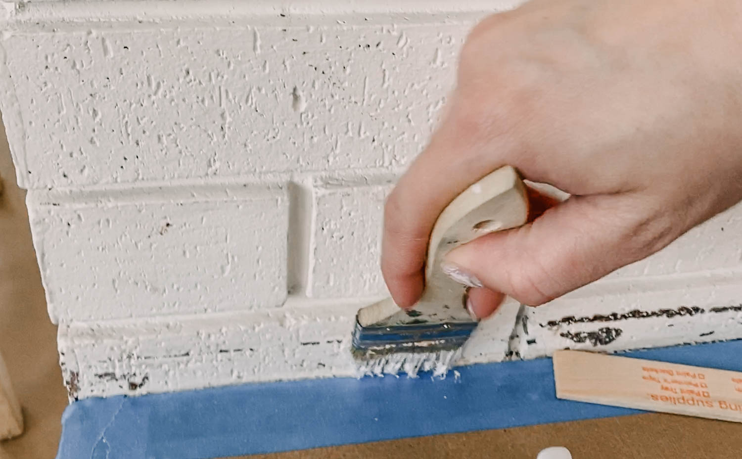 How to paint brick fireplace by hand or with a paint sprayer