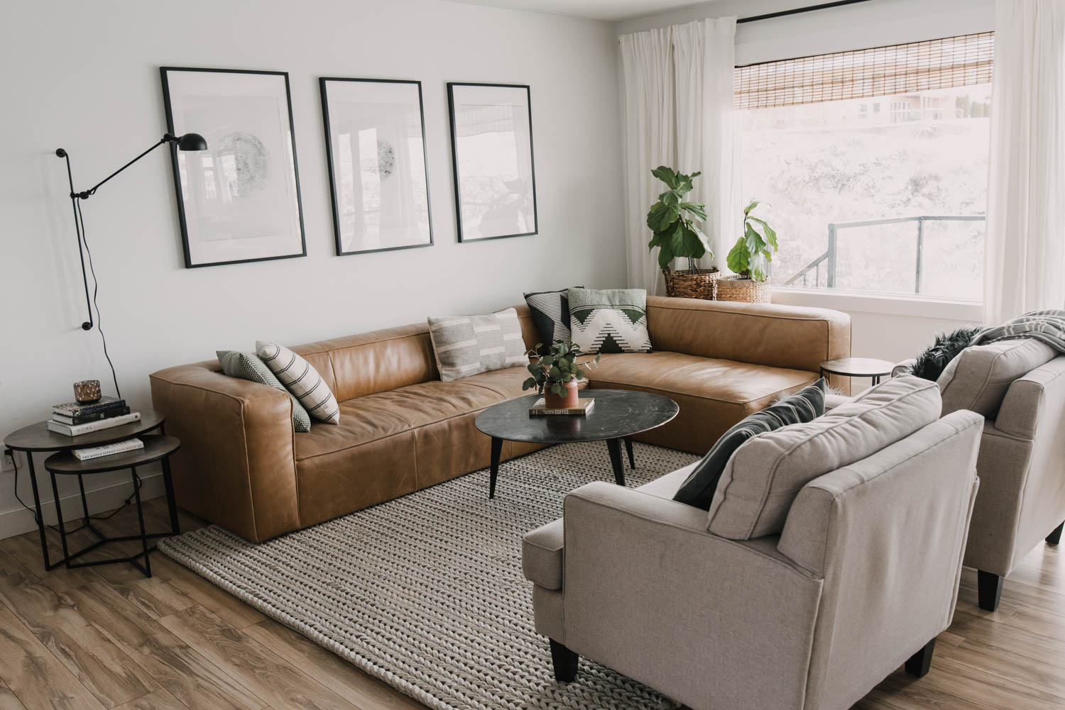 Modern ranch style living room with camel leather couch