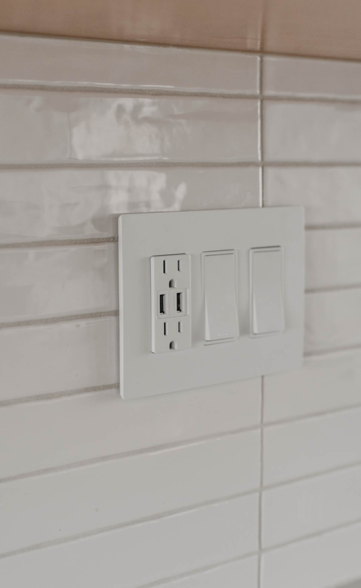 Screwless faceplate on tile- such a high end look, but DIY