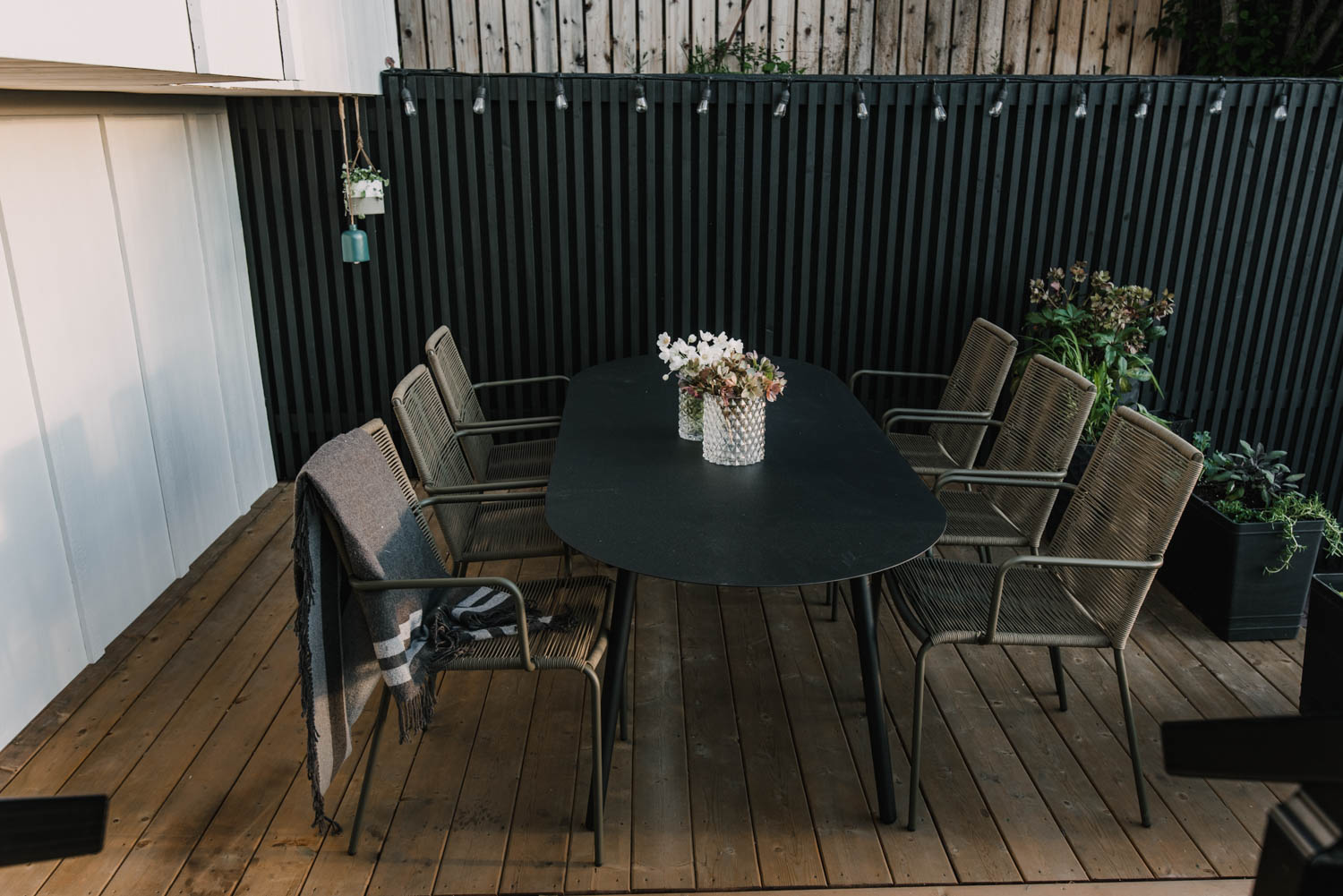 Black white and wood patio from above
