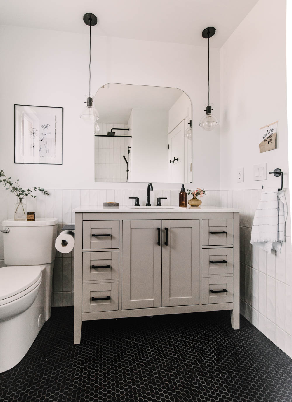 Greige painted vanity with black hardware