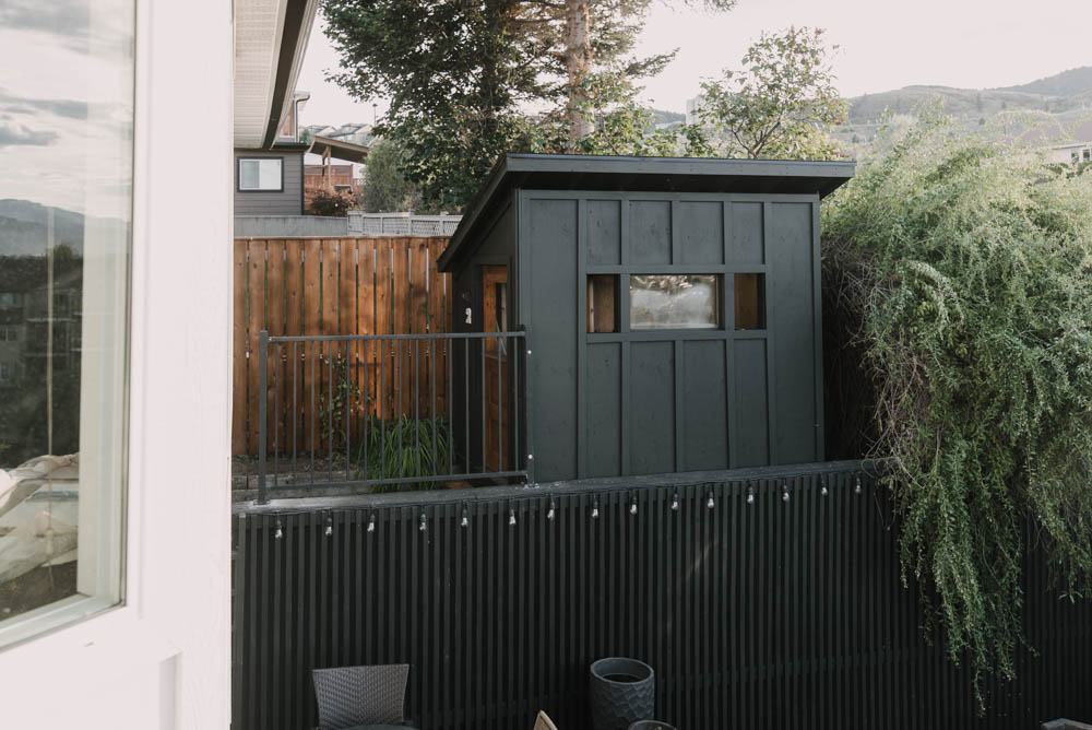 Playhouse built on retaining wall