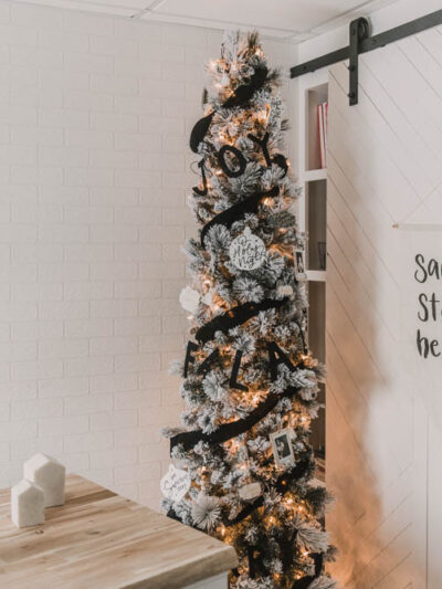 Modern black and white flocked christmas tree decor