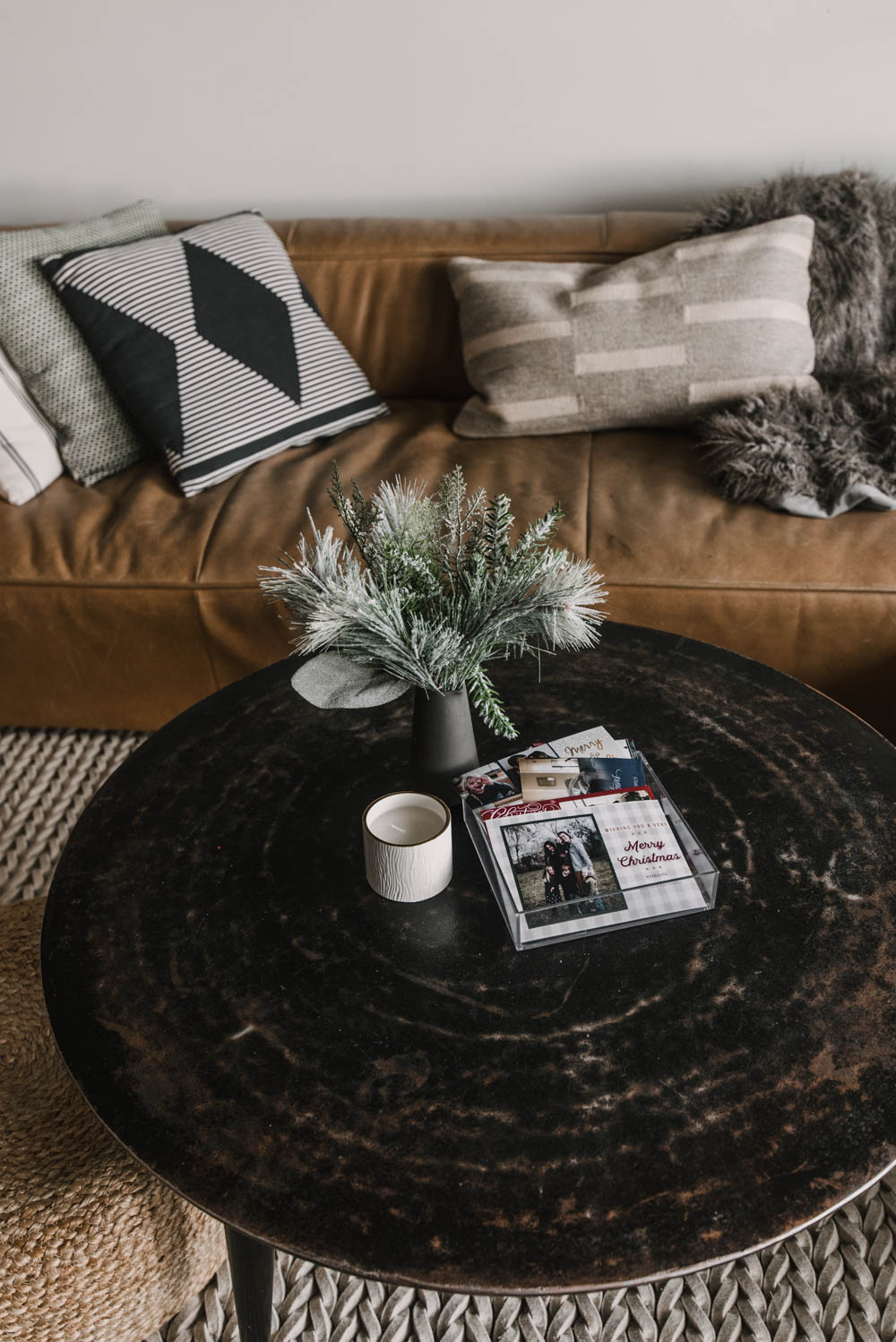 photo holiday cards in basket on coffee table
