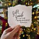 gift guide for the hand lettering lover, lettered on torn paper held in front of a christmas tree