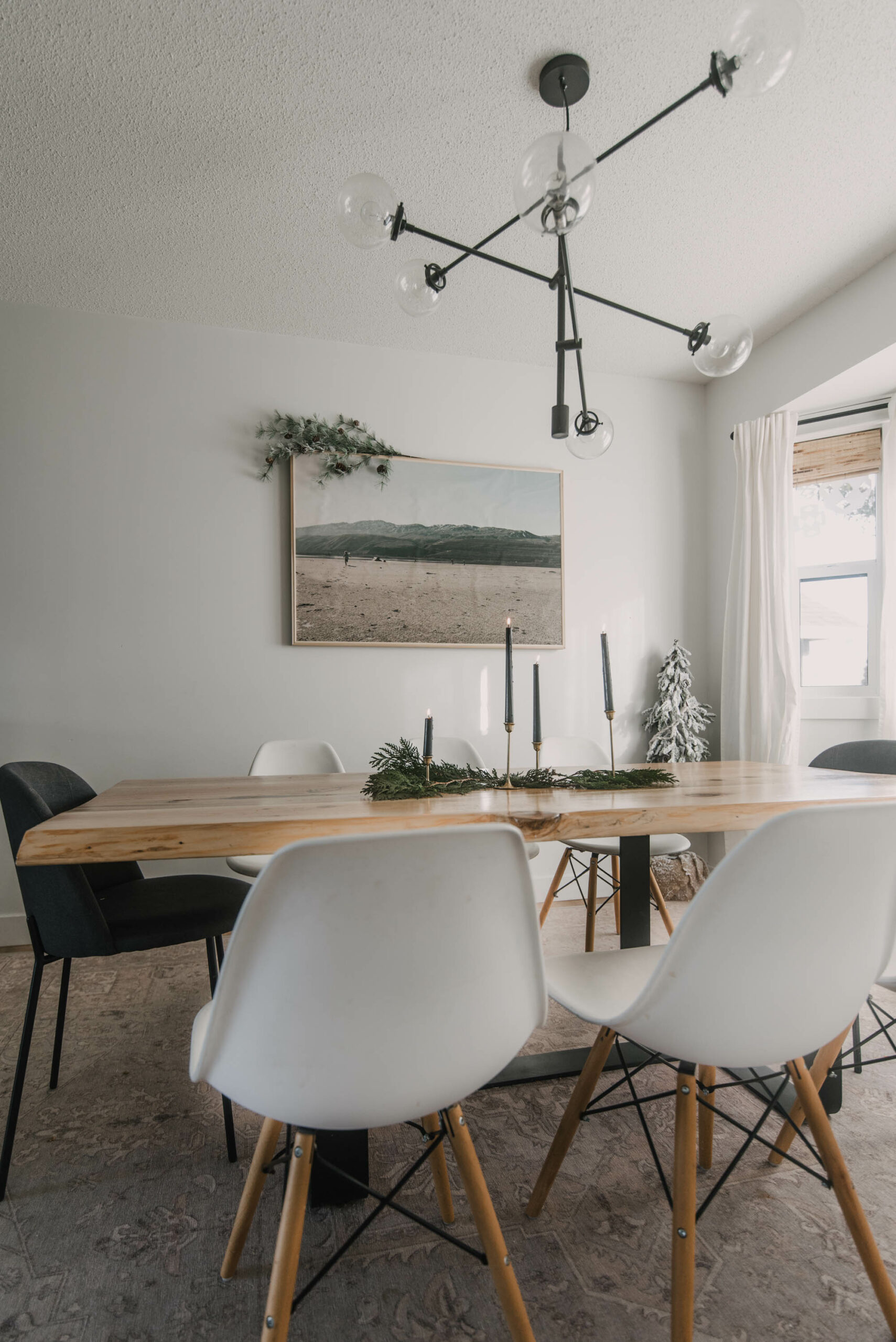 Neutral dining room decorated for the holidays