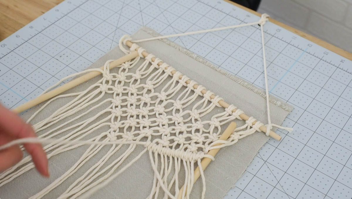 double half hitch line for a macrame stocking tutorial