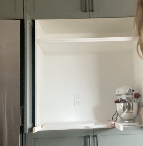 Turn a kitchen cupboard into an appliance garage