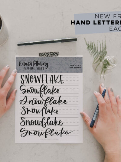 printed snowflake brush lettering practice page with text overlay: Free Printable Practice Sheet