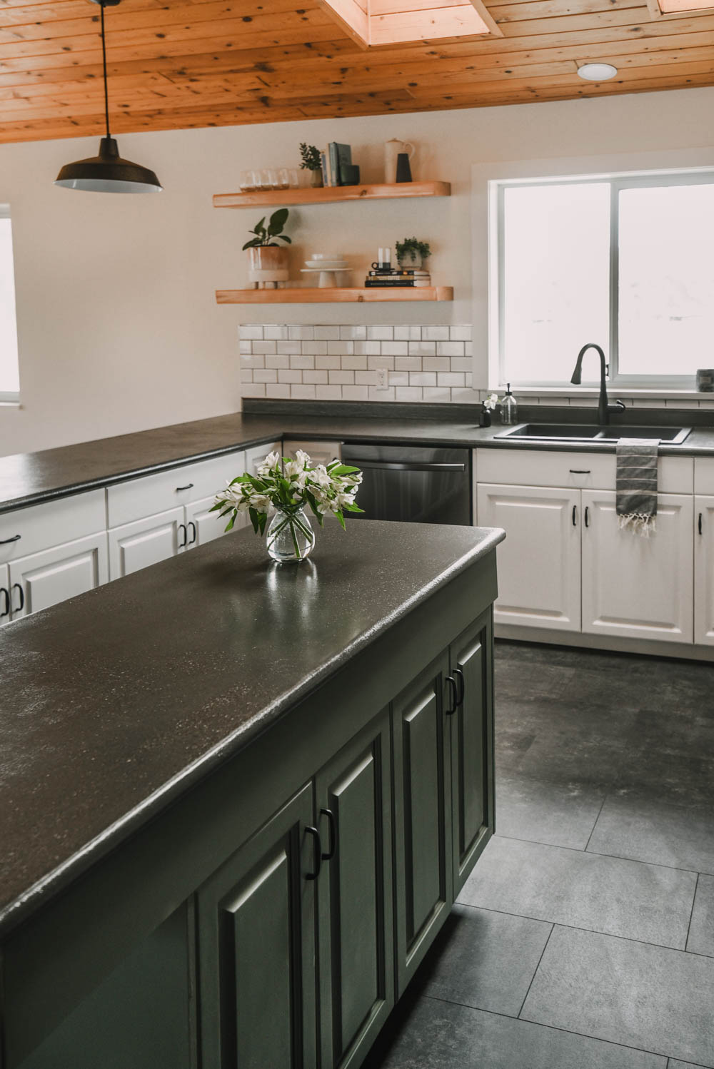 DIY Farmhouse kitchen makeover with green island, white cabinets and open shelving
