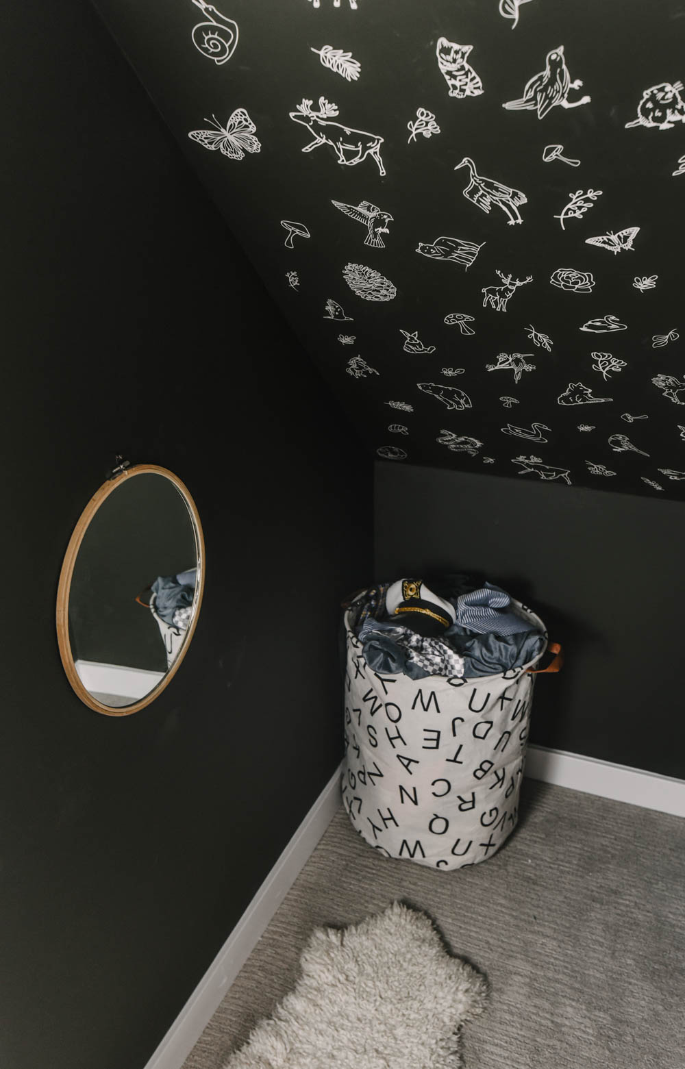 Under stairs closet turned into dress up space for kids playroom