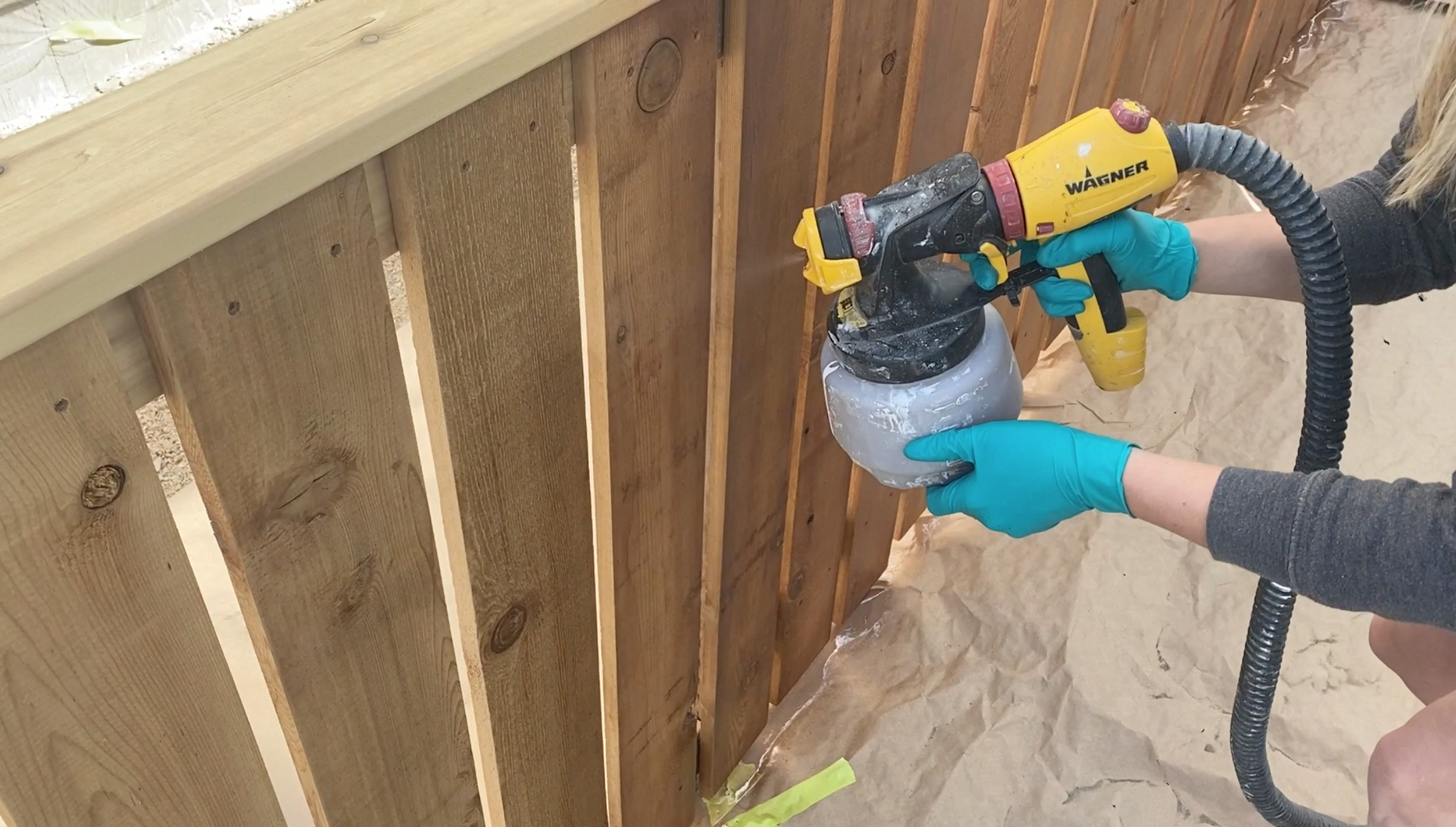 How to stain a fence with a sprayer