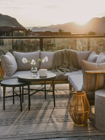 wood look lanterns against grey patio decor
