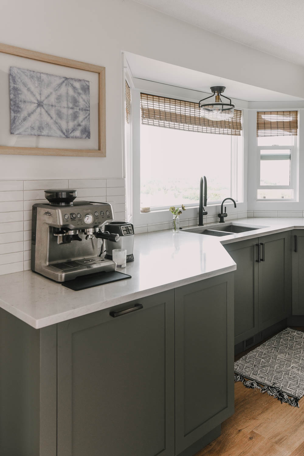 muted green shaker cabinets