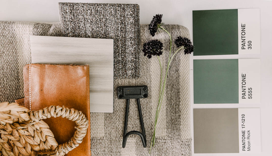 cozy green and neutral design board for a mudroom