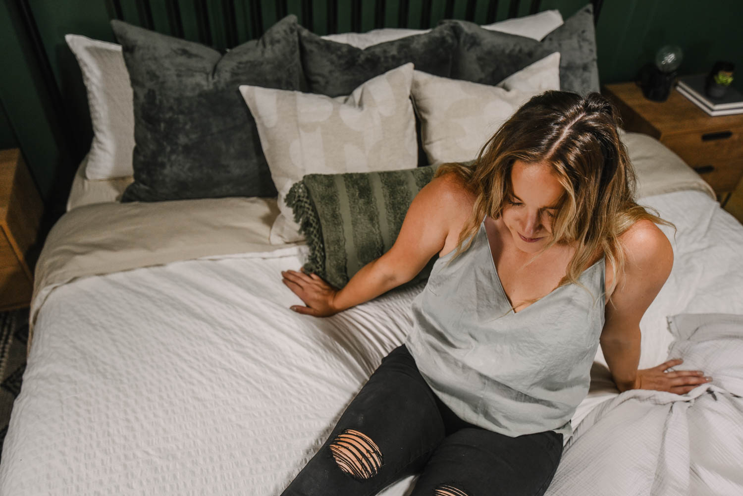 colleen on the bed we chose after shopping with this checklist
