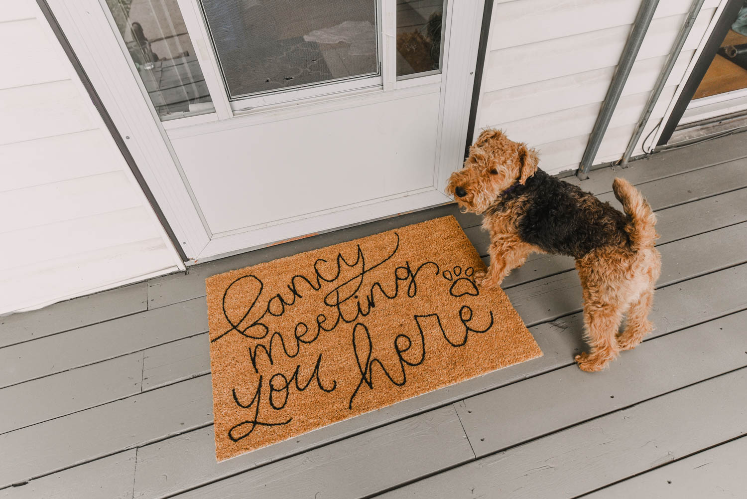 DIY door mat on freshly painted patio
