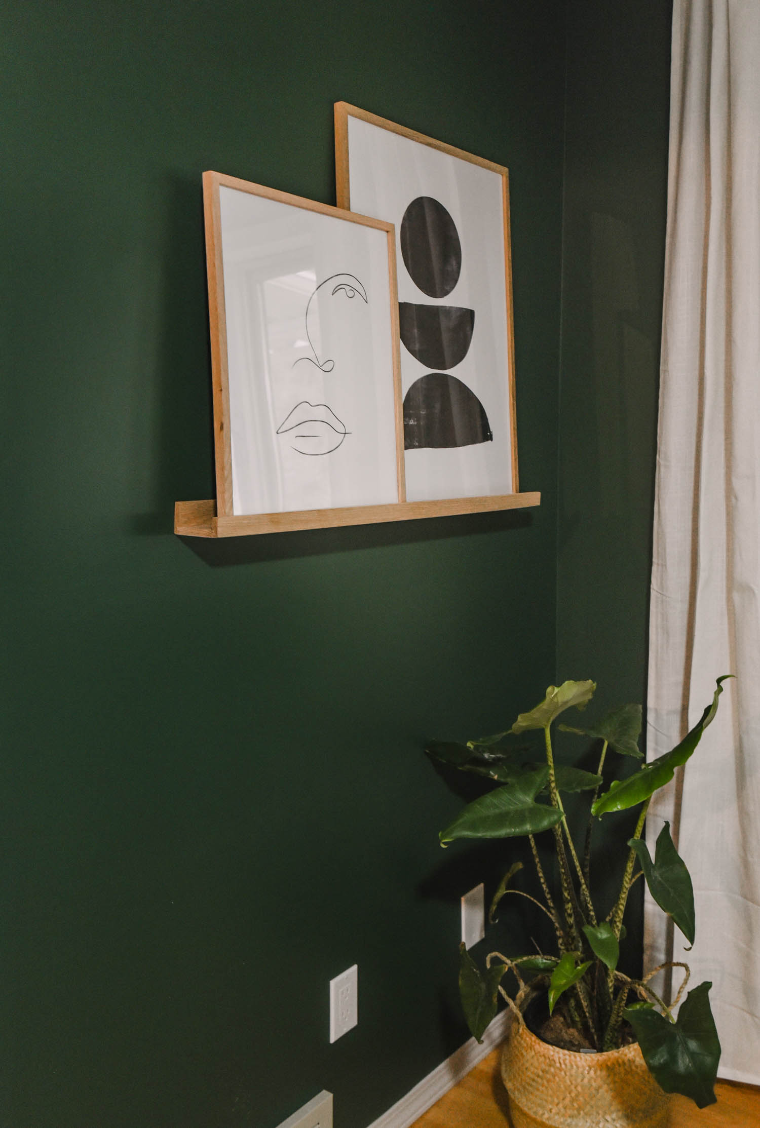 Photo ledge with modern prints