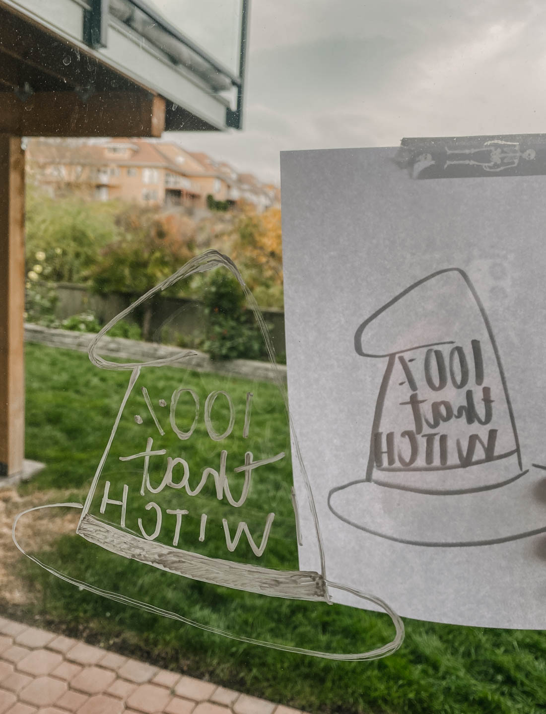 Hand lettering on windows for holiday decor